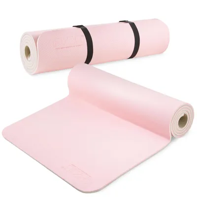 A pink yoga mat is shown, both rolled up with straps and unrolled.