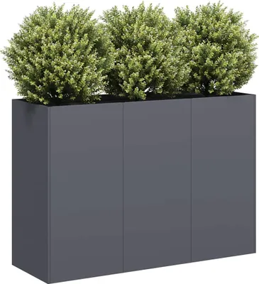 A modern, dark gray planter box filled with lush green bushes, presented against a white background.