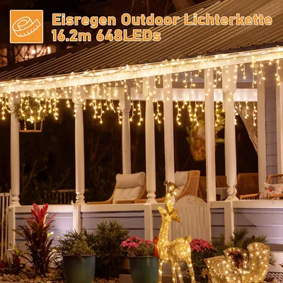 A porch decorated with outdoor Christmas lights and festive decorations.