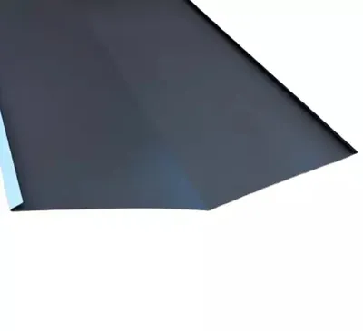 A close-up view of a dark-colored sheet of material, possibly metal or plastic, with a light blue strip along the left edge.
