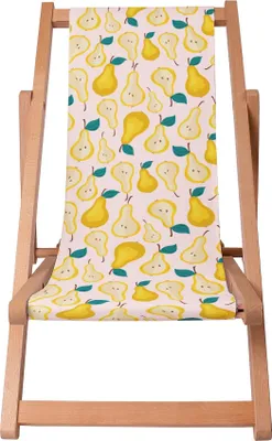 A wooden deck chair with a fabric seat featuring a pattern of sliced and whole pears.