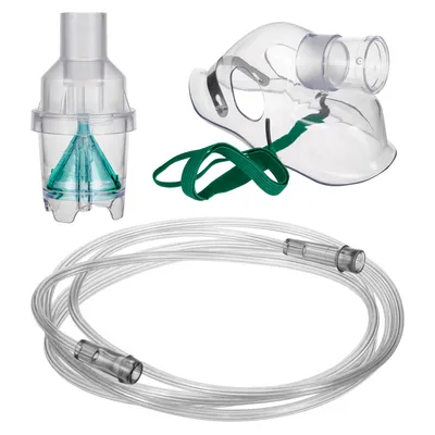 A set of nebulizer accessories including a mask, nebulizer cup, and tubing, laid out on a white background.