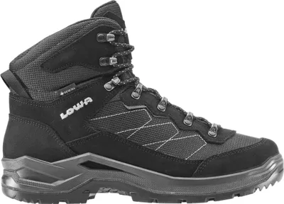 A black hiking boot is shown against a white background.