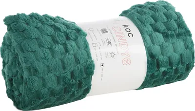 A rolled-up dark green blanket with a textured pattern, displayed on a white background.