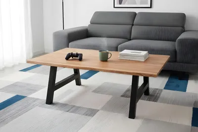 Produktbild von Couchtisch Baumkante 120x80 cm Akazie Naturfarben schwarz A-Gestell