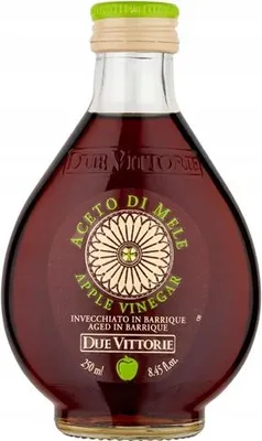 A bottle of apple vinegar on a white background.