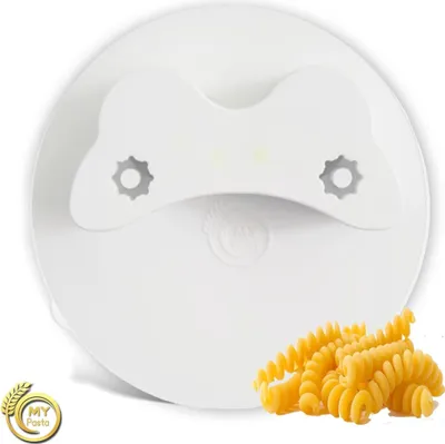 A white pasta maker attachment with fusilli pasta in the foreground, with a logo on the left.