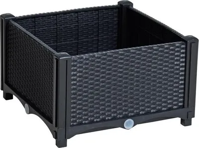 A black raised garden bed with a rattan-like texture.