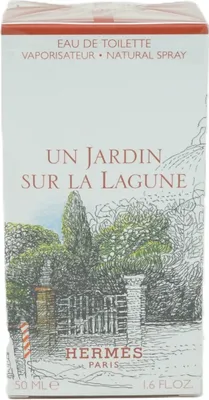 A close-up of a perfume box with an illustration of a garden scene.