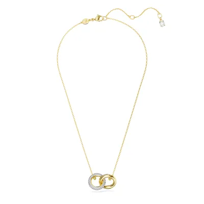 A gold-toned necklace with two interlocking rings, one of which is adorned with small crystals, displayed against a white background.