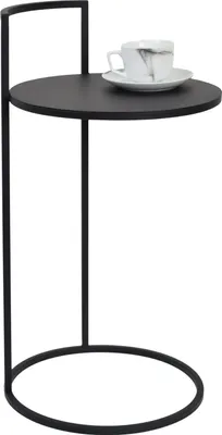 A black metal side table with a coffee cup and saucer on top.