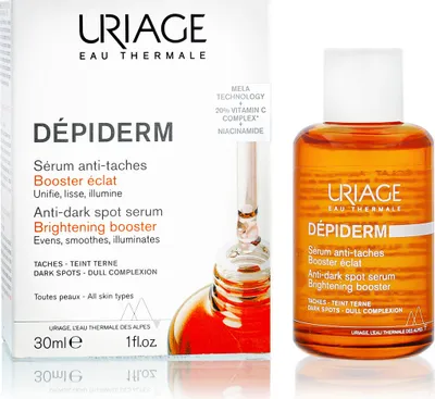 A product shot of Uriage Dépiderm Brightening Booster serum, with the product box and bottle shown side-by-side against a white background.