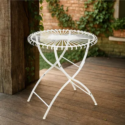 Produktbild von Romantischer Metalltisch Rund