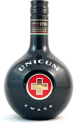 A dark, round bottle of Unicum Zwack liqueur against a white background.