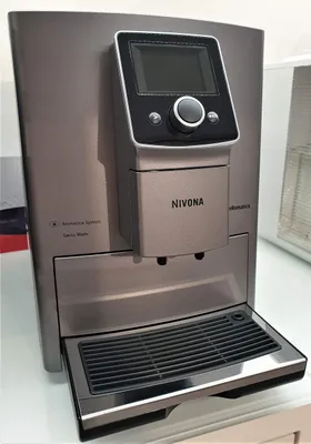A close-up, front-facing view of a Nivona coffee machine.