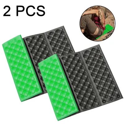 Two folded outdoor seat cushions, one green and one black, are shown on a white background. A circular inset image shows a person sitting on a green cushion outdoors.