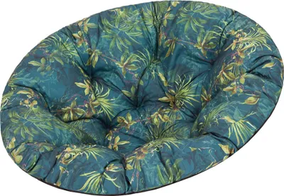 A round cushion with a tropical leaf pattern.