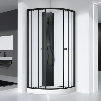 A modern black and white shower cabin in a bathroom setting.