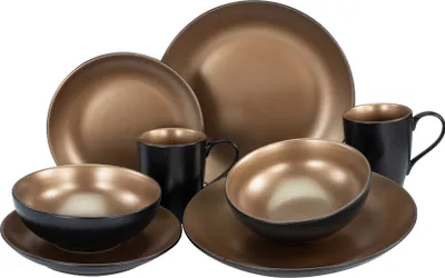 A set of dinnerware including plates, bowls, and mugs.