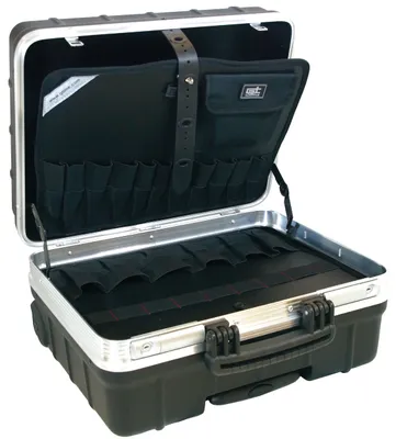 An open black and silver tool case with compartments for tools.