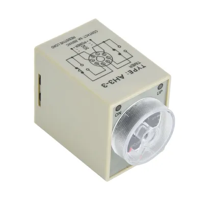 A close-up, slightly angled view of a beige electronic timer relay.