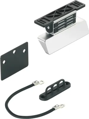 A collection of parts for a foot-operated door opener system.