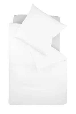 A white duvet cover and pillow are laid out on a light gray surface, viewed from directly above.