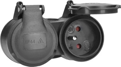 A black double electrical socket with protective covers.