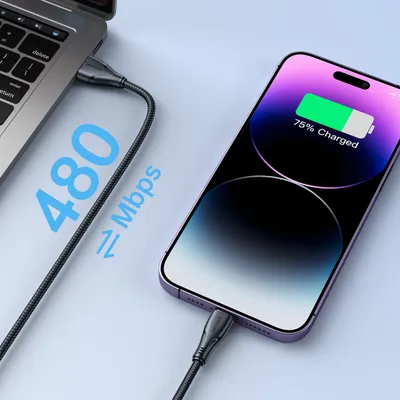 A charging cable connects a laptop to a smartphone, with text indicating charging speed.