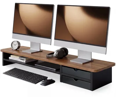 Obrázek produktu pro Stojan na monitor se dvěma zásuvkami, hnědý a černý, rozměry 108 x 23,5 x 14 cm