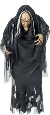 A hanging Halloween decoration of a witch.