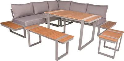 A sectional outdoor furniture set with a table and benches.