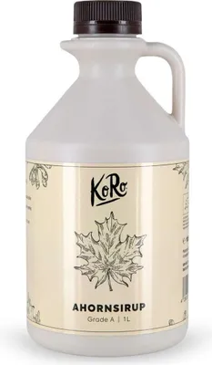 A bottle of maple syrup with a label.