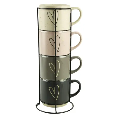 A set of four stacked mugs with heart designs on a black metal stand.