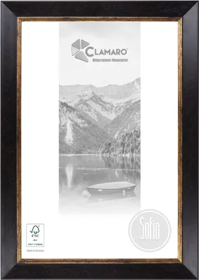 A framed picture with a landscape image inside, presented on a white background.