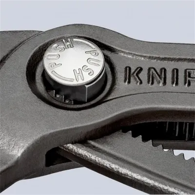 A close-up shot of a tool's adjustment mechanism.