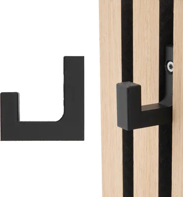 A black hook is shown next to a wooden acoustic panel with black felt.