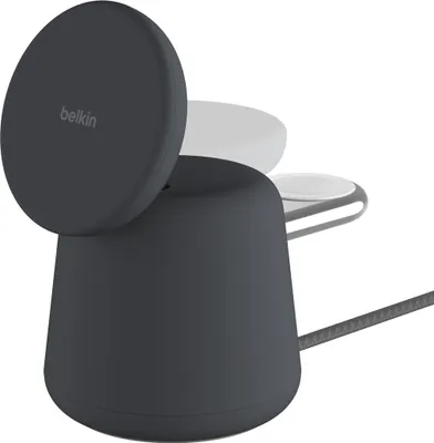 A dark gray Belkin 2-in-1 wireless charging stand with a MagSafe charger on top, shown against a white background.