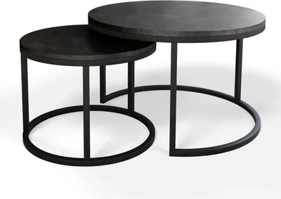 A set of two nesting round coffee tables with dark gray, textured tops and black metal frames.