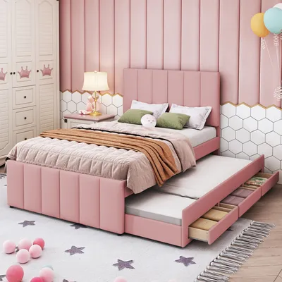 A pink upholstered bed with a pull-out trundle bed and storage drawers, set in a child's bedroom with a wardrobe and decorative wall panels.