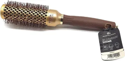 A round hairbrush with a gold barrel and brown handle, displayed on a white background with its tag attached.