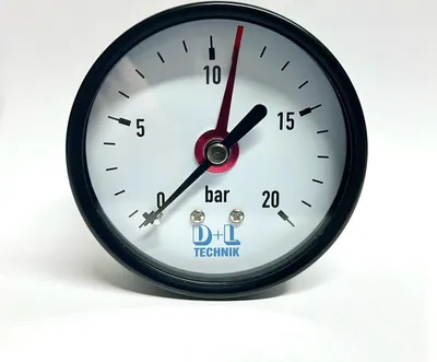 A close-up studio shot of a pressure gauge.