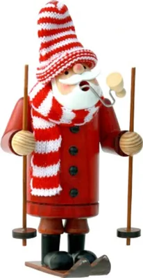 Räuchermännchen Skifahrer trägt rot-weiß gestreifte Mütze, einen Schal, rote Jacke und Skischuhe.