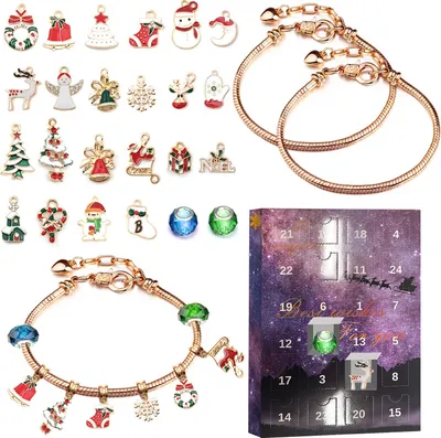 A collection of Christmas-themed charms and bracelets, along with a Christmas advent calendar.