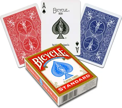 A deck of Bicycle playing cards with two cards displayed face up and one card face down.