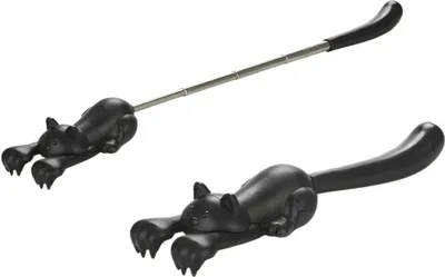 Two black cat-shaped back scratchers are shown against a white background. One is extended on a metal rod, and the other is shown as a standalone item.