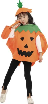 A young girl wearing a pumpkin costume.