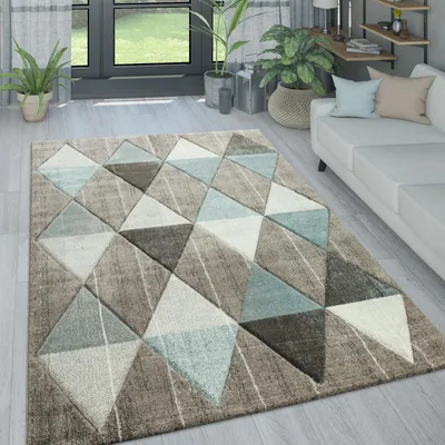 Image de Tapis de salon aux couleurs pastel, motifs modernes en losanges, triangles et zigzags, dimensions 120 x 170 cm