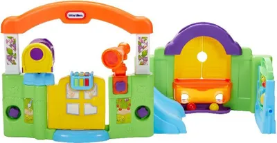 A colorful plastic activity gym for toddlers.