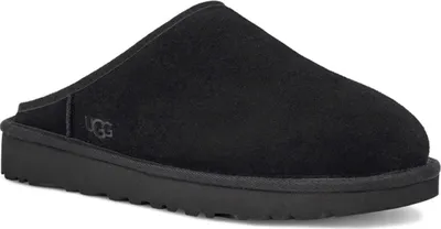 A black Ugg slipper is shown from a side angle on a white background.